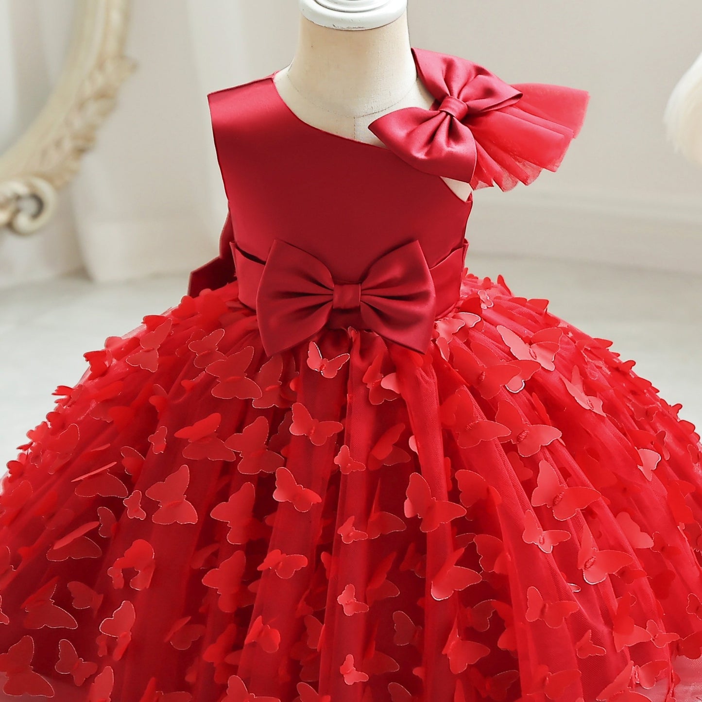 Toddler girls princess dress with butterfly design, bow belt, and flutter mesh sleeves, perfect for parties and birthdays.