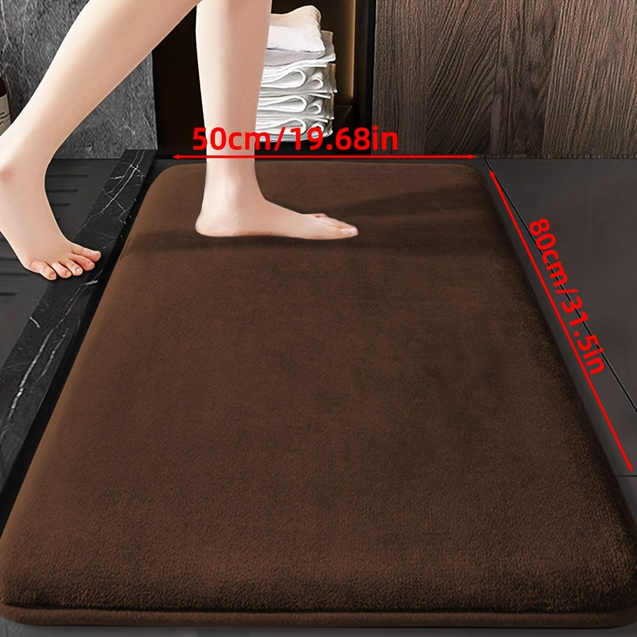 Soft and durable polyester bathroom mat with geometric design, ideal for shower, bathtub, bedroom, and living room. Versatile and non-slip, it is highly absorbent and machine washable.