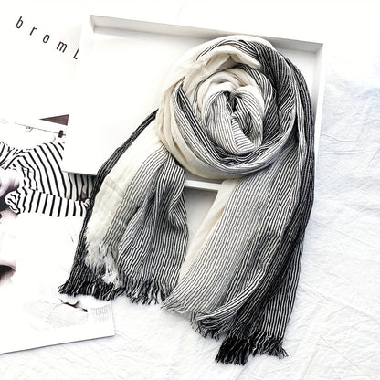 Elegance meets simplicity with our Classic Striped Tassel Scarf, the perfect fashion accessory.