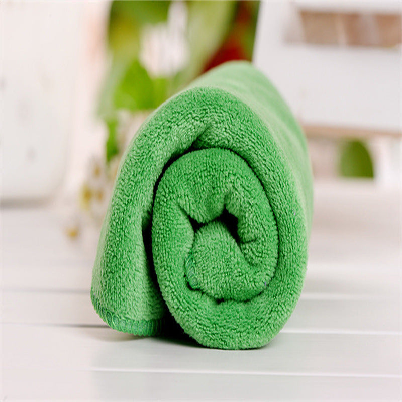 Soft microfiber towel perfect for camping, sports, swimming, and travel - dries quickly and absorbs well.