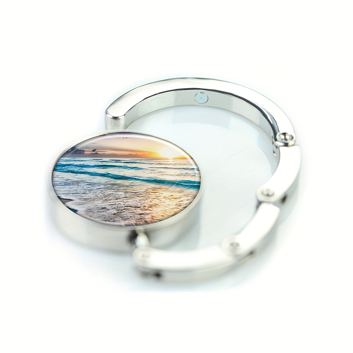 Get organized in style with this Zinc Alloy Purse Hanger featuring a cute Sea Beach Design. This Foldable Handbag Hook is perfect for storing your handbag in Romance Style. It serves as a decorative Folding Purse Holder for Tableside storage.