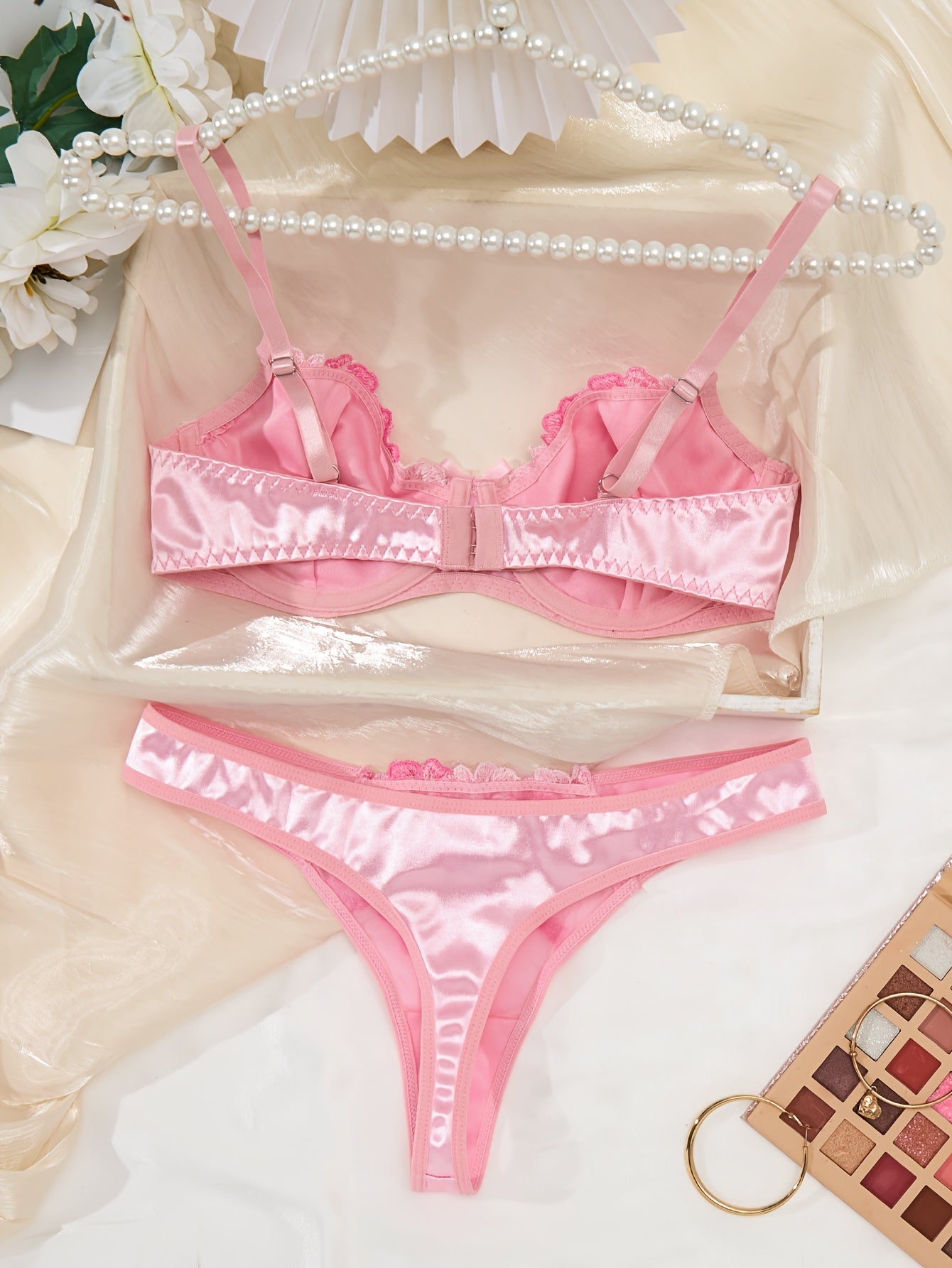 Chic pink floral lingerie set for women, featuring a comfortable push-up bra and low-rise briefs - ideal for casual wear.