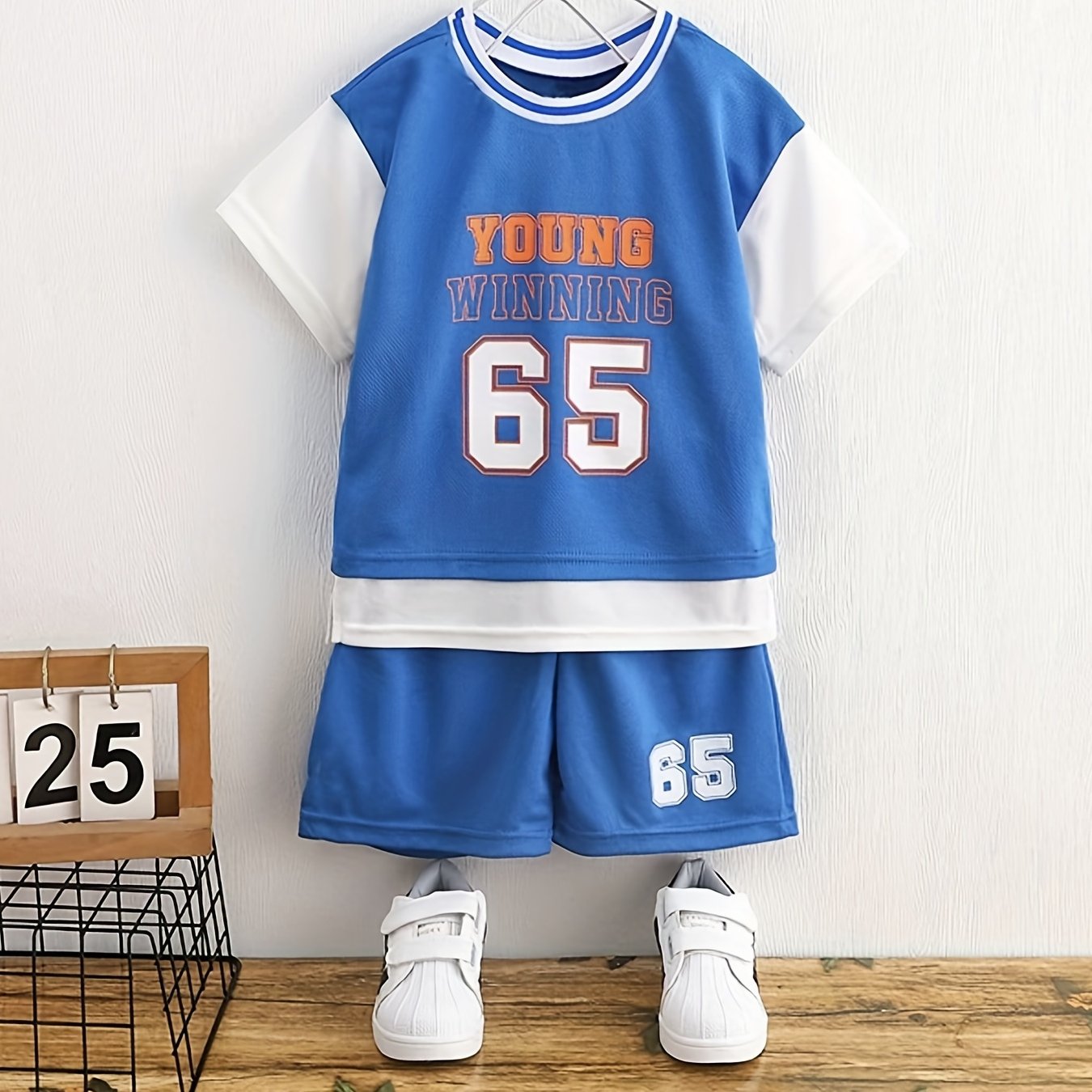 Boy's "Young Winning" casual outfit set includes a round neck t-shirt and shorts, perfect for daily and outdoor wear.