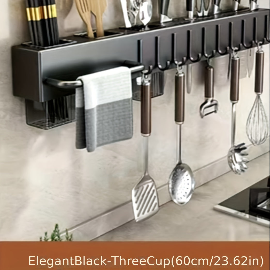 Wall-mounted knife rack made of premium carbon steel, offering a large capacity for organizing knives, spatulas, spoons, forks, chopsticks, and towels. Features integrated dry and wet separation draining storage, no-drill installation, and a