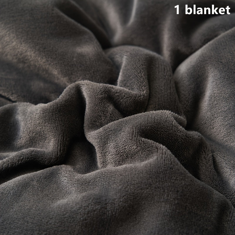 Stay cozy with the Contemporary Milk Velvet Reversible Sherpa Fleece Blanket in Solid Deep Gray. This soft and warm polyester throw is perfect for the sofa, bed, travel, and camping. Easily machine washable with no fading, this all-season multipurpose