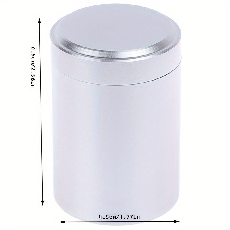 A compact stainless steel tea canister with sealed storage, ideal for on-the-go use. Packaged in a gift box, this household essential is perfect for storing tea on your travels.