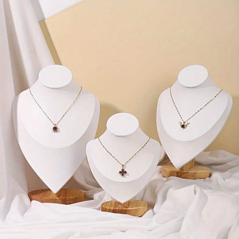 Wooden mannequin jewelry stand for displaying necklaces on dresser or window, ideal for home organization or retail showcasing.