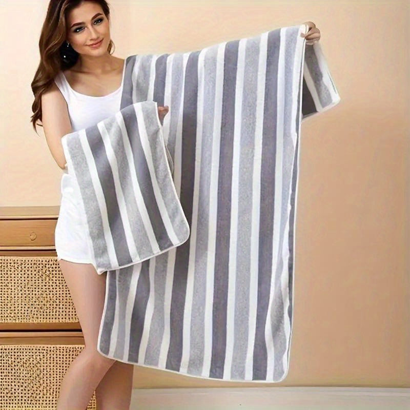 Set of 2 luxurious soft touch bath towels with stripes, highly absorbent and quick-drying for ultimate comfort, suitable for home decor and spa use.