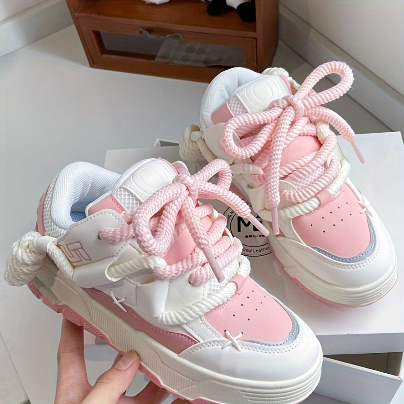 Pink chunky lace-up sneakers for women with a low-top, thick sole. Made with fabric/PU upper and rubber sole, suitable for all seasons.