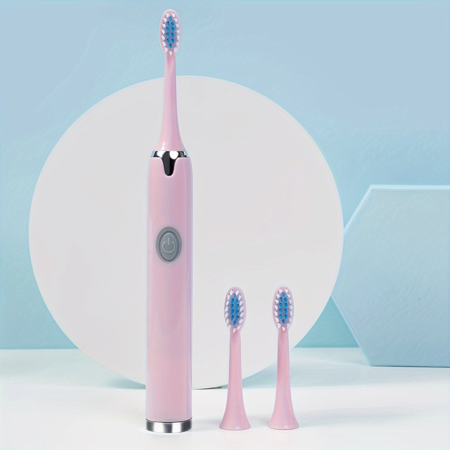 Set includes a battery-powered travel toothbrush, portable toothbrush, and 3 brush heads. Batteries not included.