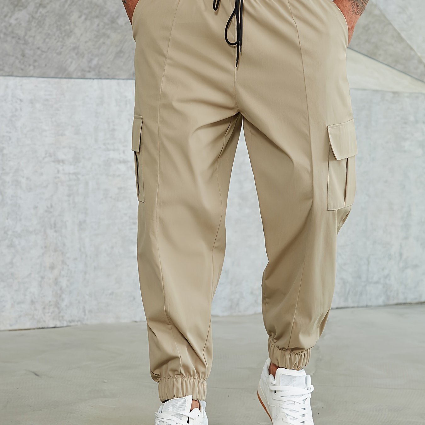 Solid cargo pants for plus size men, ideal for sports and outdoor activities.