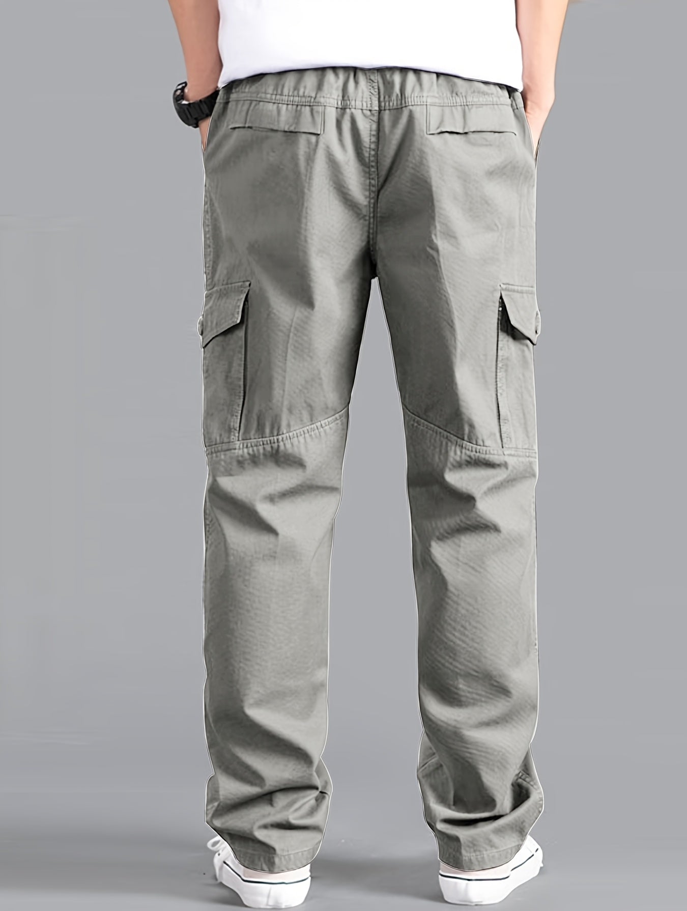 Casual cotton cargo pants for men, with solid color, multi-pocket design, loose fit, and non-stretch woven fabric. Ideal for daily wear in the Spring/Fall Collection.