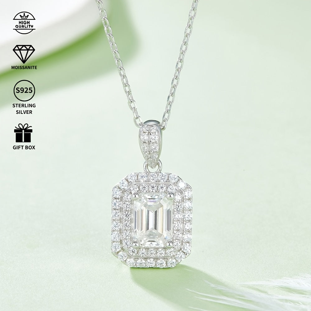 This elegant Moissanite jewelry set features a high-quality S925 silvery inlay. The set includes a necklace and earrings, with the necklace weighing approximately 3.23g and the pendant featuring a stunning 1.0ct main stone. The earrings are approximately