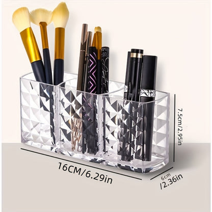 Stylish acrylic makeup brush holder with diamond pattern design and three compartments for pens, eyebrow pencils, and lipstick. Perfect for home organization.