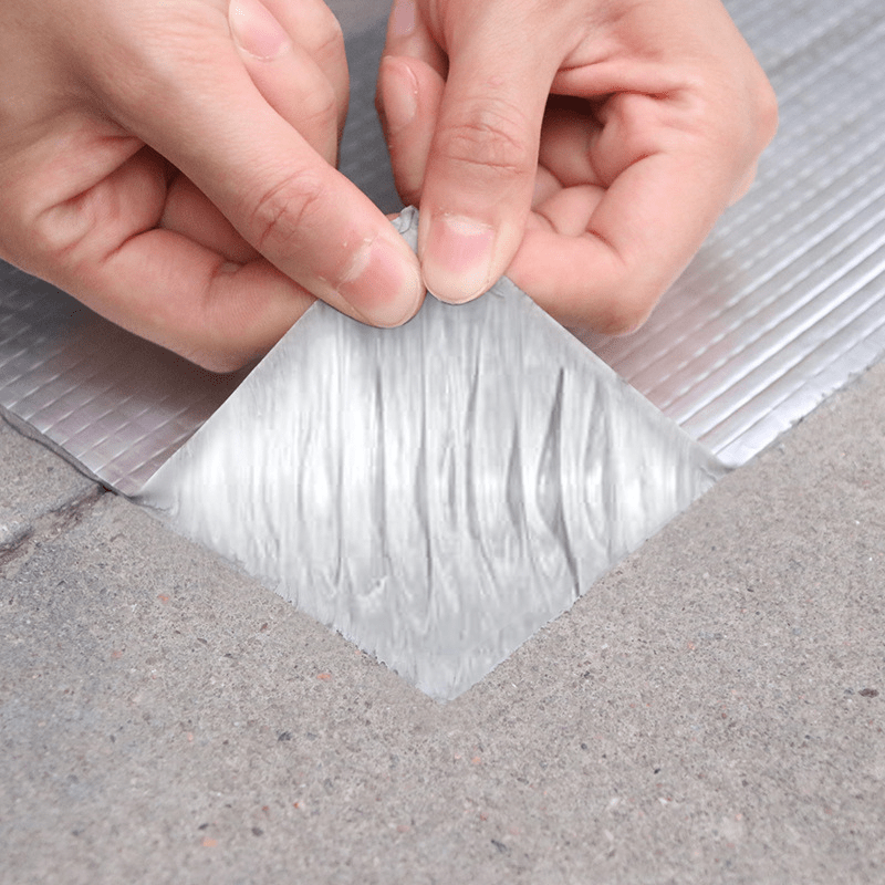 Waterproof self-adhesive aluminum foil tape caulk for sealing leaks on tile roofs, pipes, and home renovations. 1 roll, 5cm x 100cm.