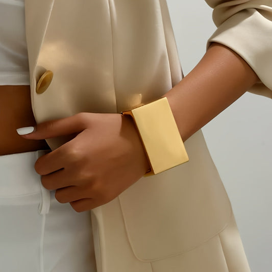 Golden-tone Wide Geometric Zinc Alloy Bracelet featuring Square & Round Shapes design. This trendy accessory embodies Street Style, European and American fashion. With its luxurious, exaggerated, and minimalist aesthetic, the Abstract Vintage piece