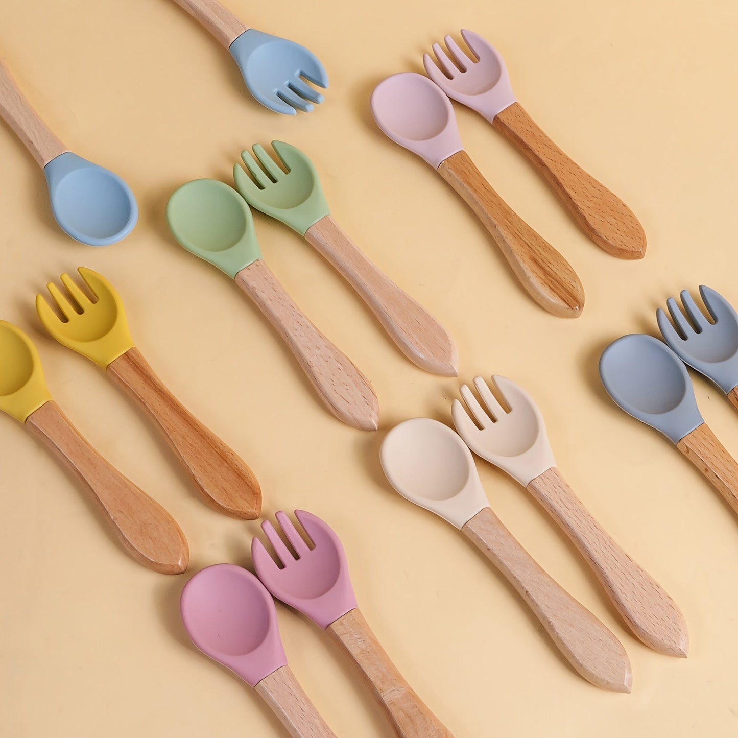 Set of baby fork and spork made from bamboo and silicone, perfect for toddler self-feeding. Ideal for baby-led weaning and makes a great gift for newborns or special occasions like Christmas, Thanksgiving, and Chinese New Year.