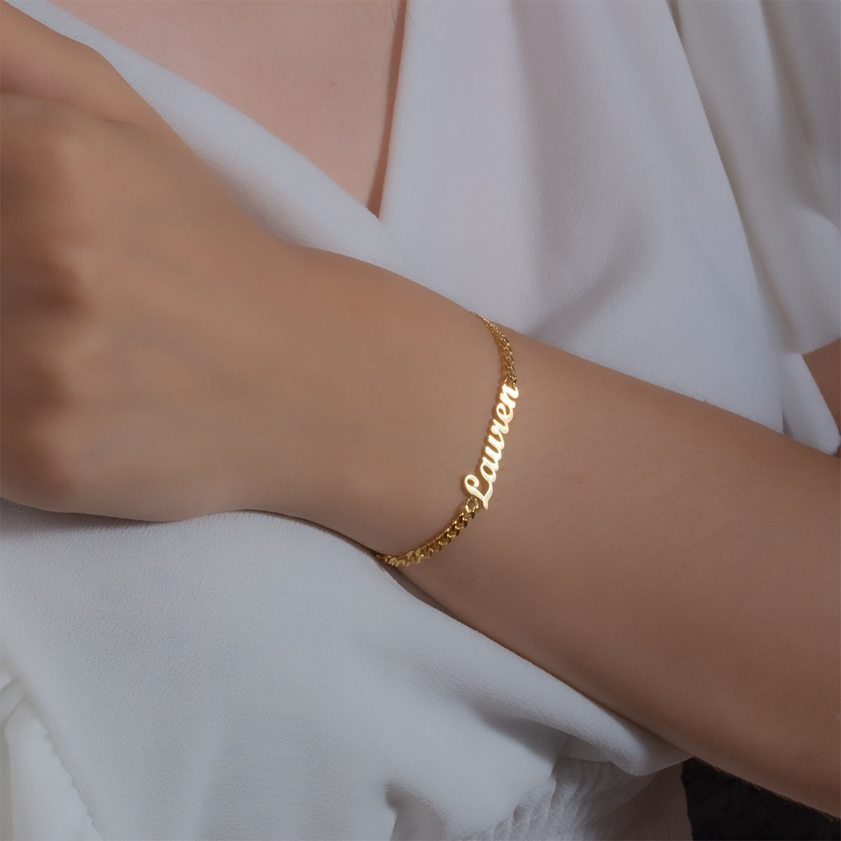 Give the perfect gift of elegance with this customizable bracelet made from 18K gold-plated stainless steel. Featuring a sleek minimalist design crafted with precision through welding and laser cutting, this bracelet is ideal for Valentine's Day or