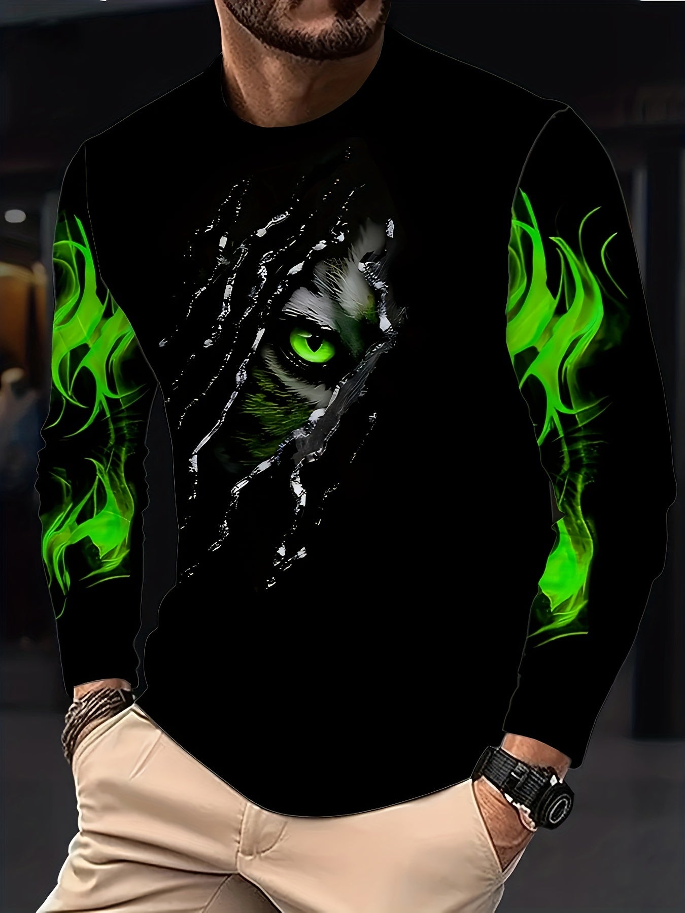 Men's slim fit long sleeve crew neck t-shirt with green eye and flame design, made of polyester knit with slight stretch and featuring animal pattern graphic tee.