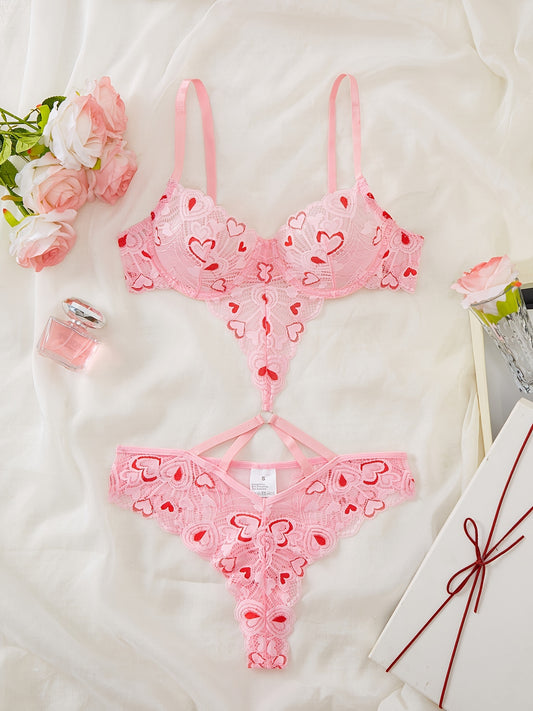 Pink heart-embroidered adult lingerie set made from polyamide and elastane blend, suitable for adults.