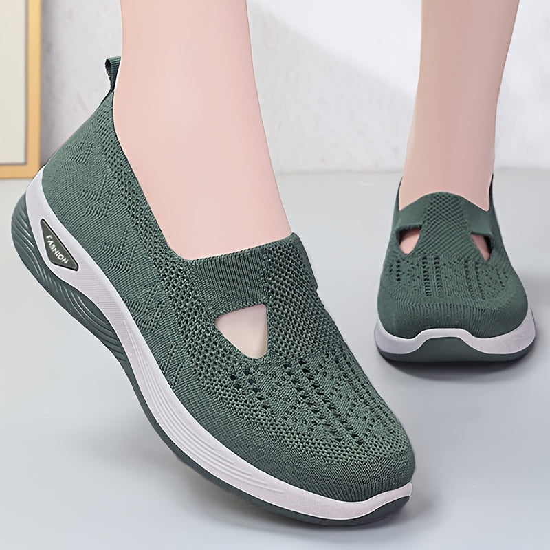 Breathable mesh slip-on sneakers for women with a comfortable PVC sole and loose fit.