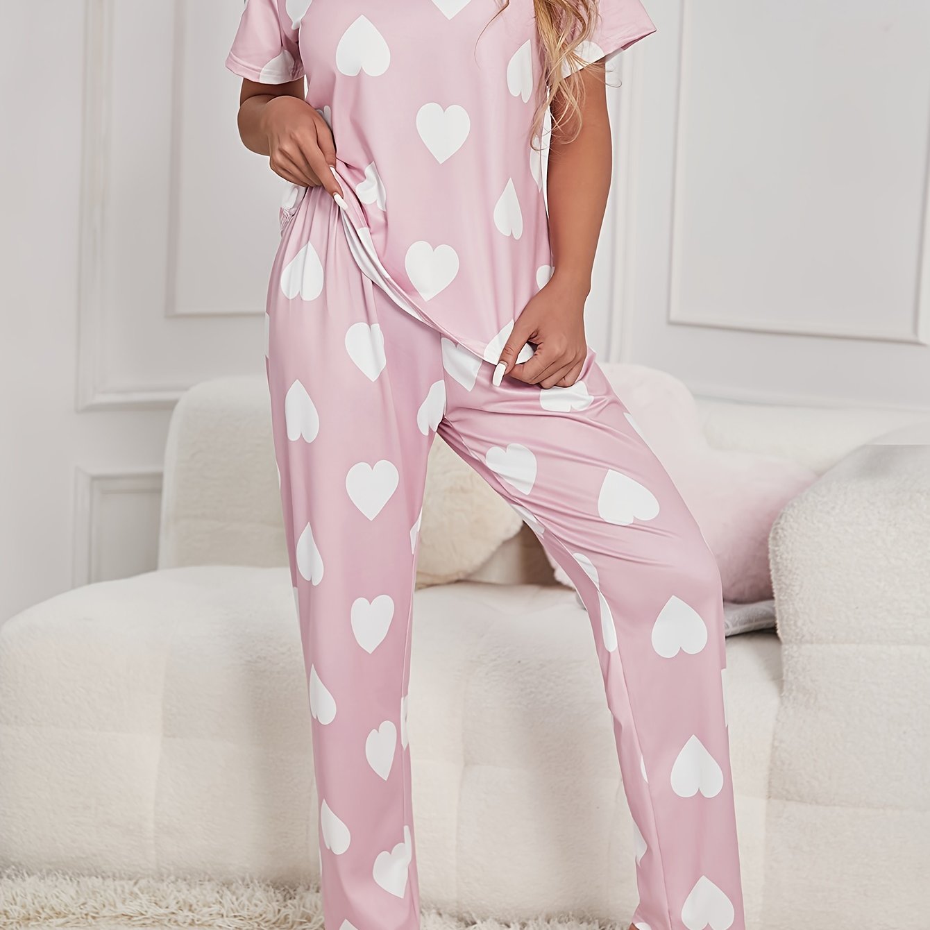 Two-piece pajama set with short-sleeved top and long pants in print.