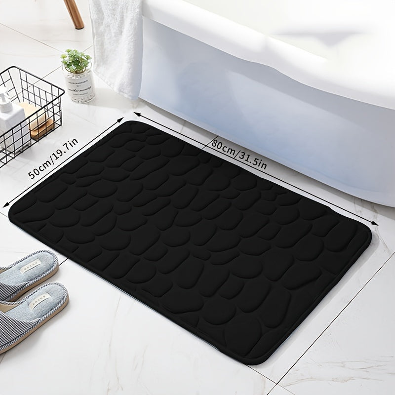 Soft, non-slip coral fleece bathroom mat in a pebble pattern. Quick-dry, machine washable, and low pile for comfort and home decor. Made of plush polyester fiber with knit fabric and 100% polyester material. 570gsm and 1.4cm thick.