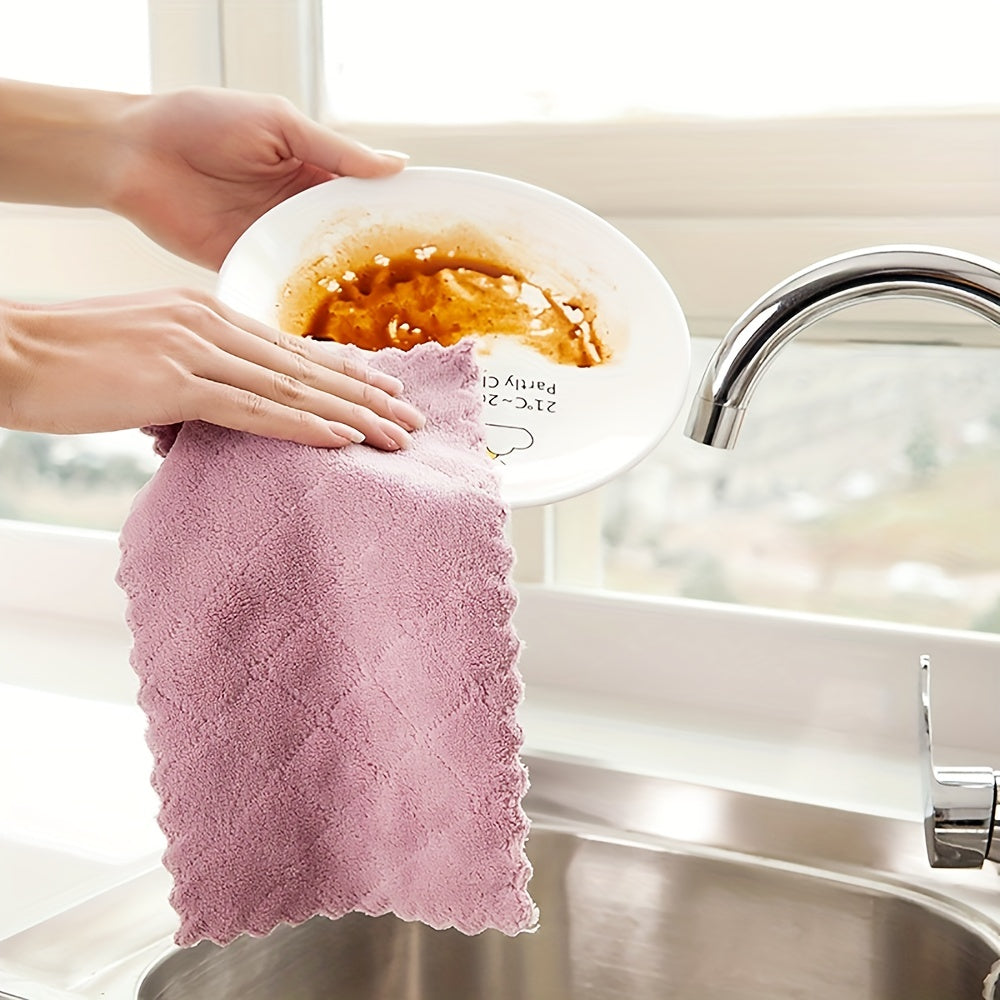 A set of 10 Microfiber Towels for the kitchen, designed to absorb moisture and clean up messes easily. These versatile cloths can be used for wiping down dishes, cleaning up spills, and tidying up the house.