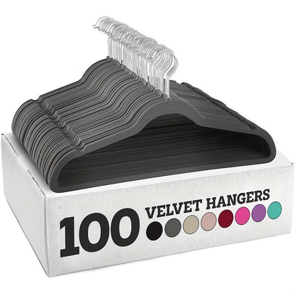 Set of 100 high-quality velvet hangers, measuring 44.96cm each. These non-slip flocked felt hangers are perfect for coats and suits, featuring a 360 degree swivel hook for convenience. Each hanger can hold up to 6.8 KG of weight.