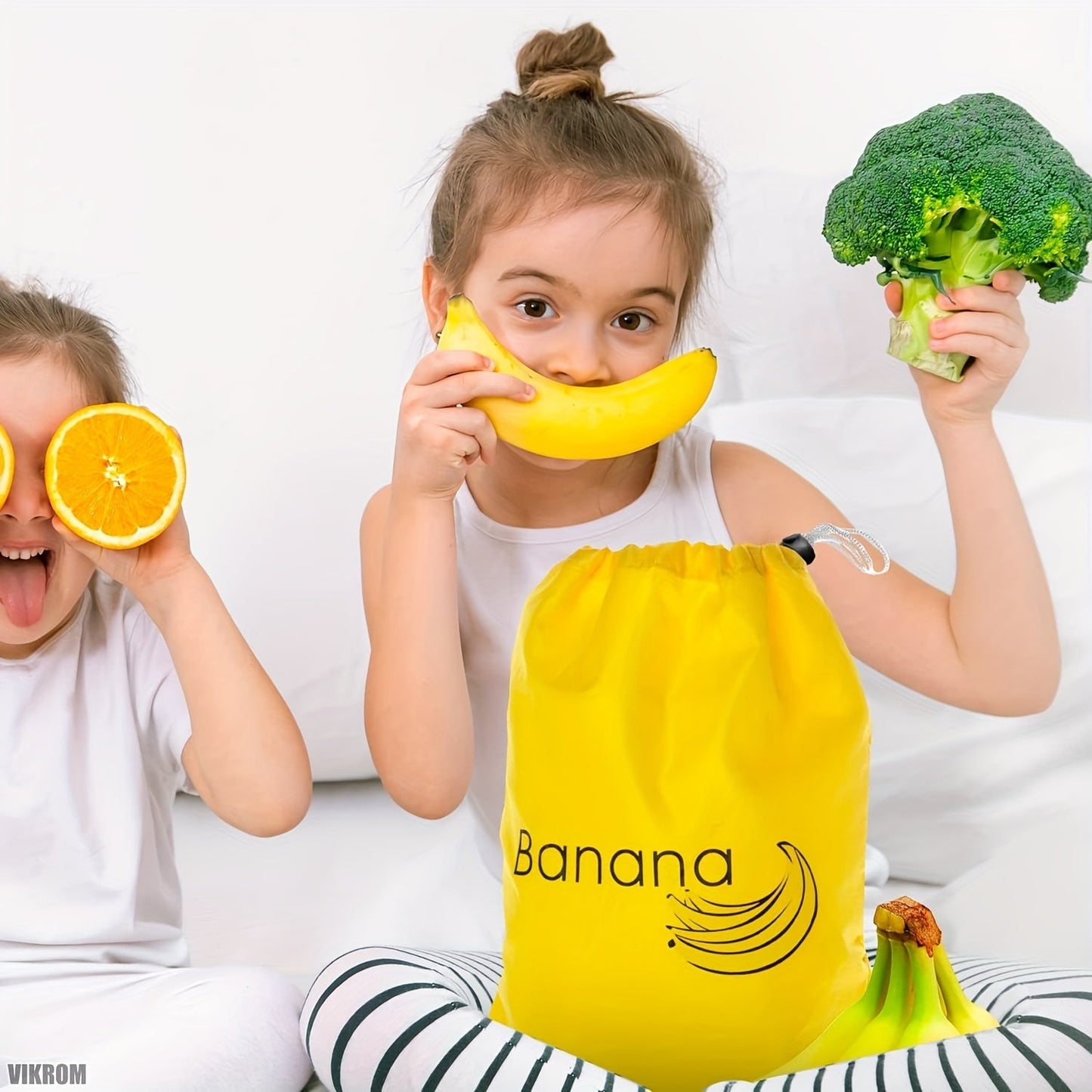 Reusable banana storage bag with drawstring, made of food-grade nylon and aluminum. Large capacity and double stitched to prevent ripening. Ideal for storing fruits and vegetables in the refrigerator. Perfect for lettuce and other vegetables.