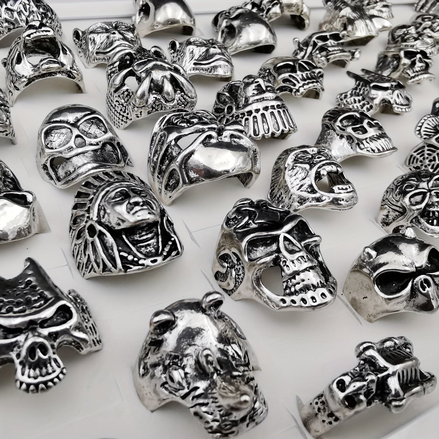 Set of 10, includes Skull Beast Head Claw Rings in a variety of styles and colors. Perfect for those who love skull jewelry.