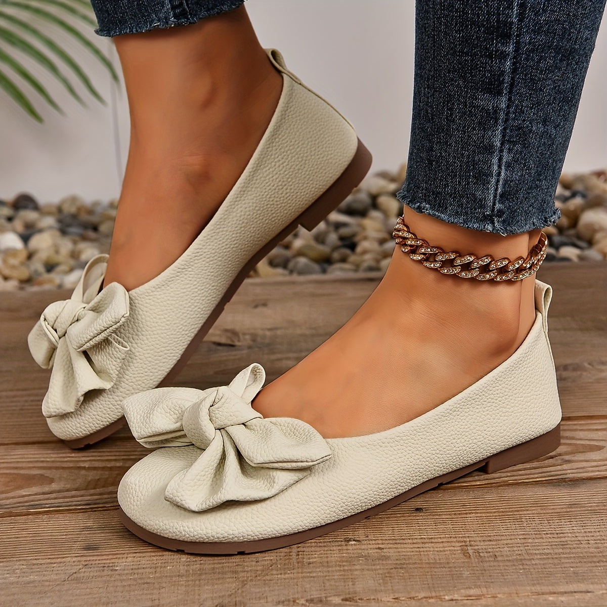 Chic beige Oxford flats with bow detail for work and casual wear.