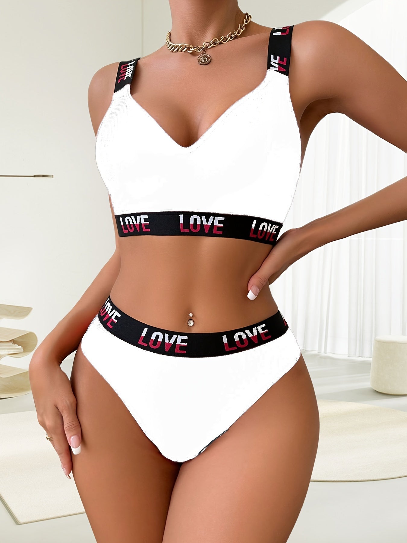 Ribbed bra and thong set with contrasting color letter print.