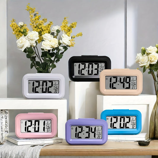 Compact pink mini LED desk clock with backlight, temperature, and calendar. Multifunctional kitchen timer for students. Sleek rectangular design with digital display. Battery-powered (AAA). Minimalist aesthetic.