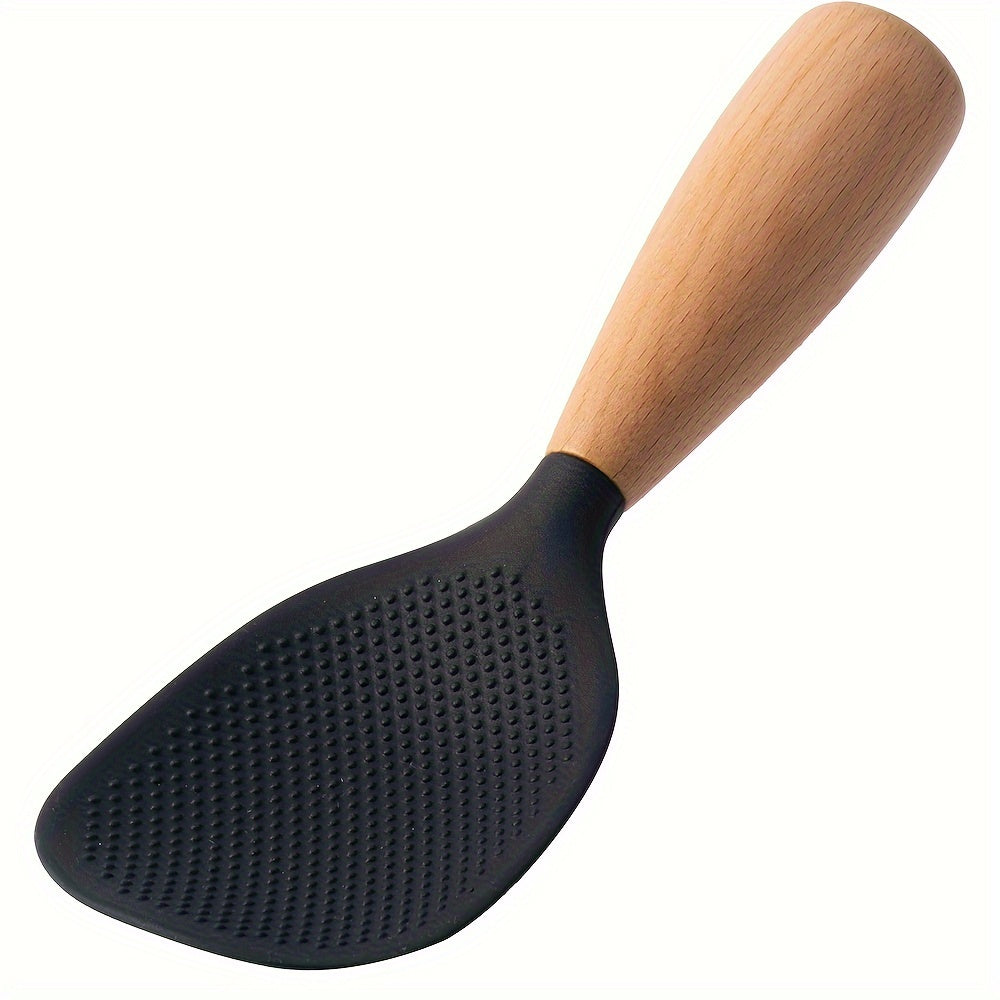 Heat resistant silicone spoon with wooden handle for non-slip rice cooker. Practical kitchen tool for home, school, and dorm.