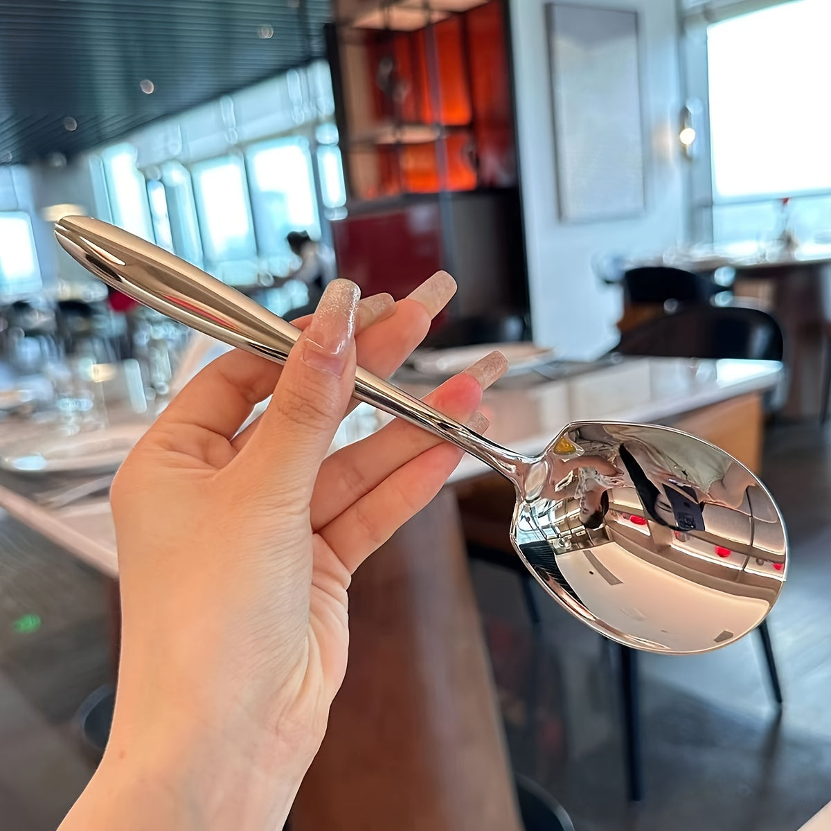 Sleek and durable stainless steel square spoon for buffet, dinner parties, and everyday use. Suitable for serving and cooking.