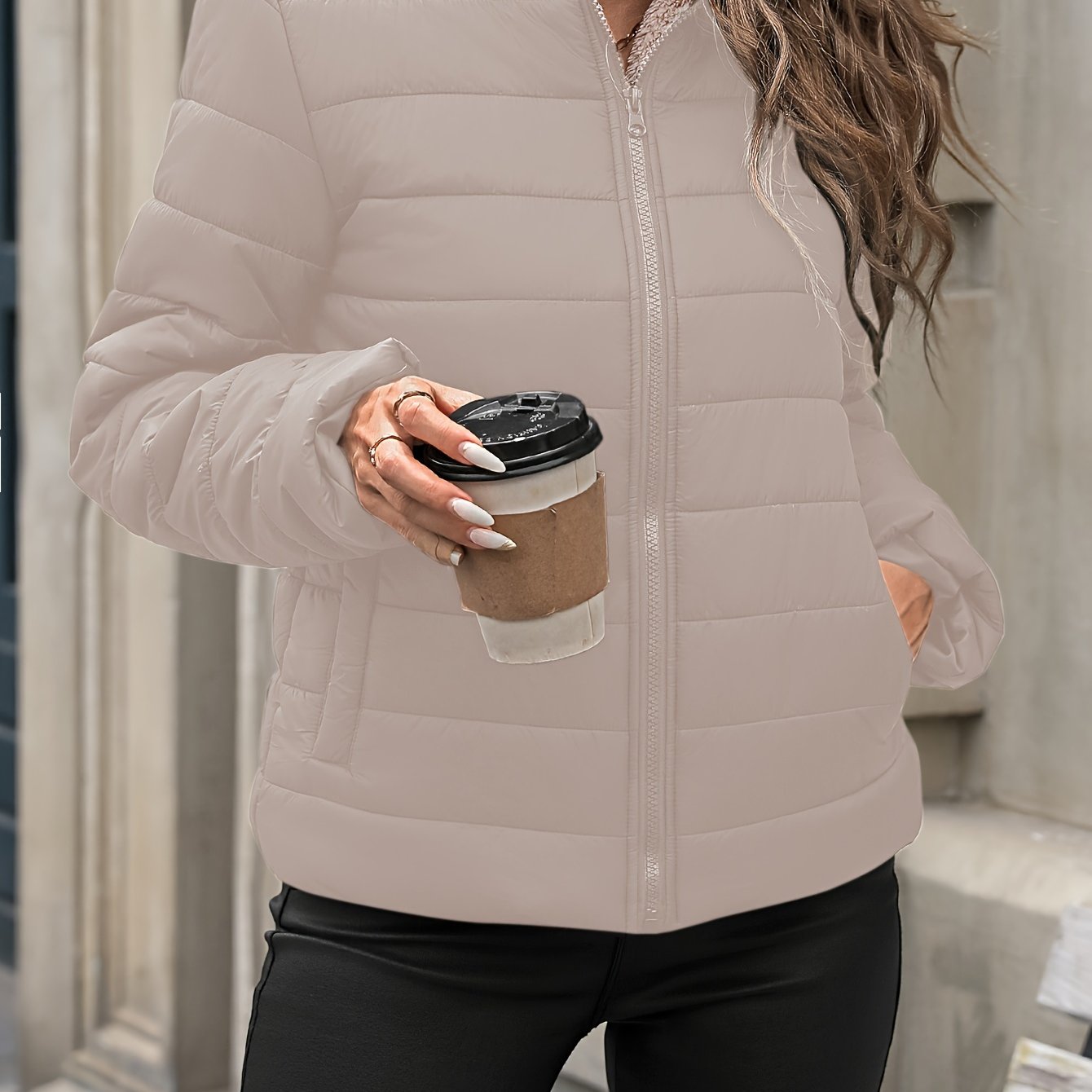 Solid color warm jacket for women, with long sleeves and zip-up closure, made of 100% nylon.