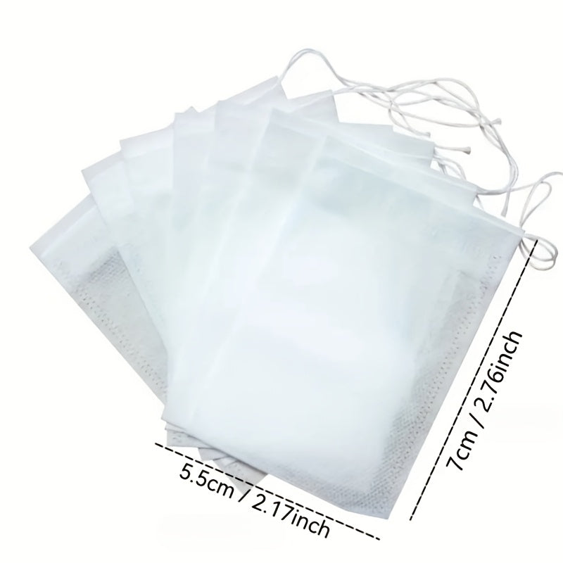 Pack of 100 High-Quality Disposable Tea Bags - Clear Non-Woven Material Ensures Flawless Brewing - Great for Both Home and Business Settings, Convenient Tea Infusion|Natural Tea Accessory|User-Friendly Tea Packaging