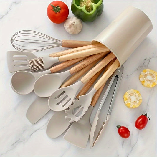 Set of 12 pieces of silicone tableware, including kitchen utensils and cookware for safety. This set features wooden handles on the non-stick cookware for easy use and cleaning. Modern and washable kitchen supplies, including small tools and essentials.