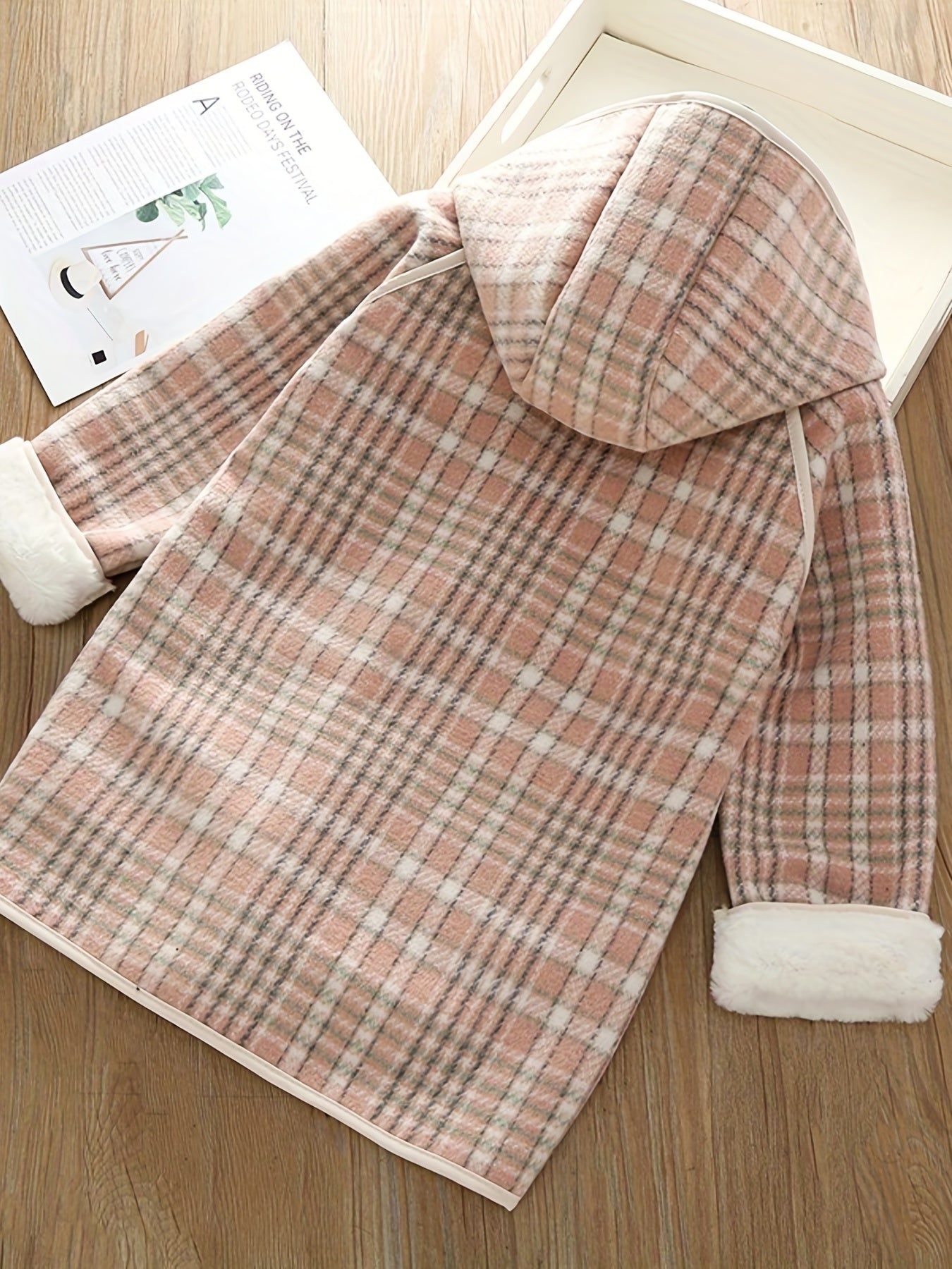 Girls' winter fleece plaid toggle coat with hood and pockets for a stylish outdoor look.