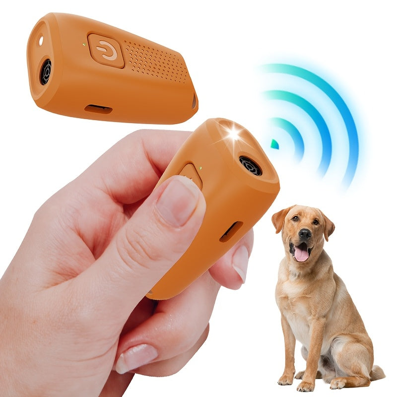 Portable USB rechargeable dog repeller with soundwave technology and LED light for training and anti-barking.