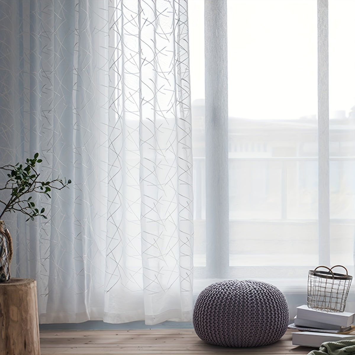 Create a modern and sophisticated look in your living room or bedroom with this 1-piece simple line embroidery sheer curtain. Featuring a sleek geometric design in white, this translucent curtain filters light beautifully while adding a stylish touch to