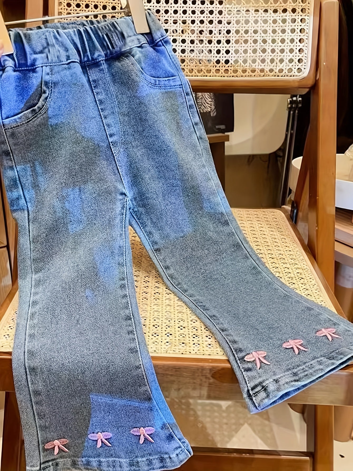 Cute bow-knot denim jeans for baby girls. Made with soft knit fabric, cotton blend, machine washable. Ideal for spring and fall.