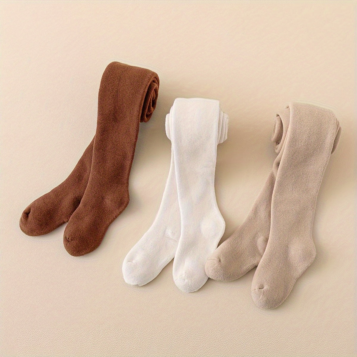 3 pairs of girl's solid knitted pantyhose for spring and autumn fashion.