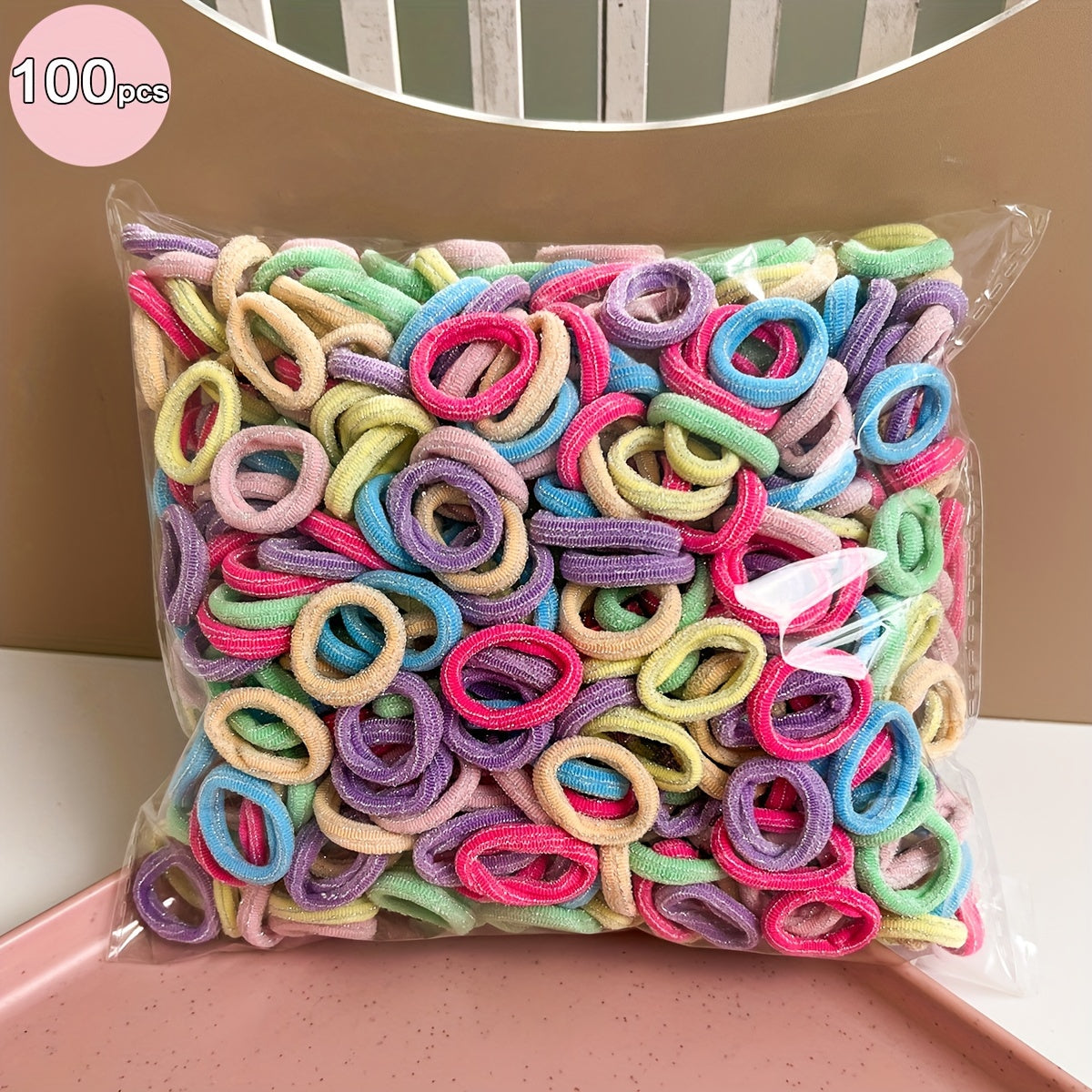 100 high elasticity rubber bands for girls, perfect for creating hair buns and ponytails without causing damage.