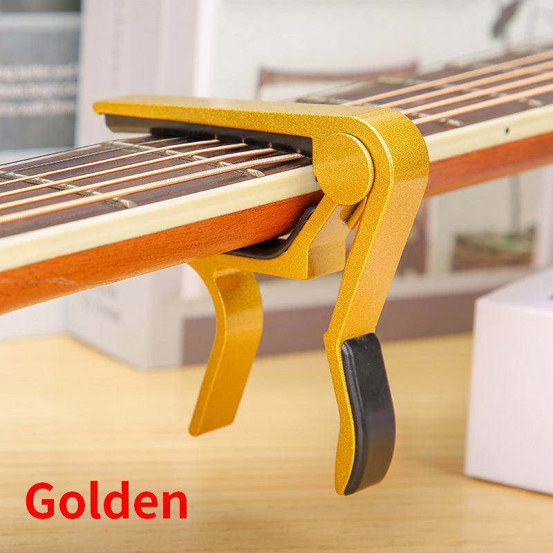 Aluminum alloy guitar capo for acoustic, classical, electric guitars and ukuleles, quick change with tone adjustment.