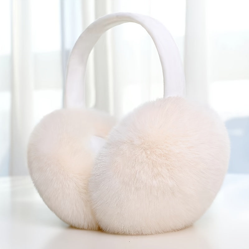 Stay cozy and stylish this winter with our Women's Foldable Knit Cashmere Earmuffs. Crafted with faux fur for warmth and comfort, these earmuffs are perfect for outdoor activities. The stretchable plush design hugs your ears, keeping them