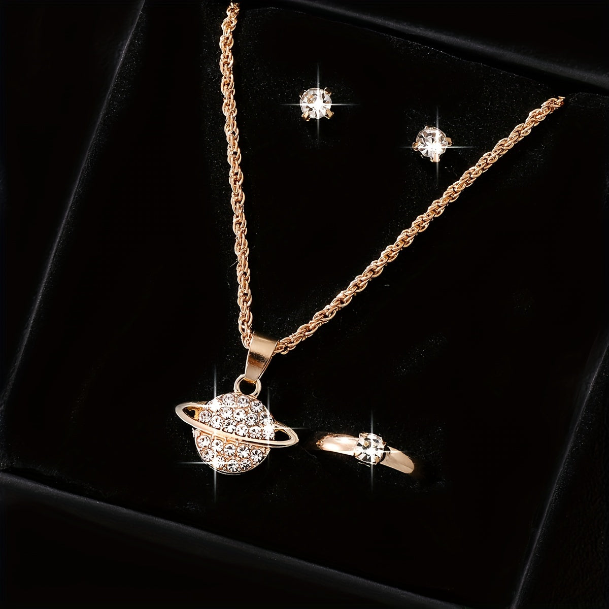 Stylish women's jewelry set includes planet pendant necklace, 2 stud earrings, and 1 ring for daily or vacation wear.