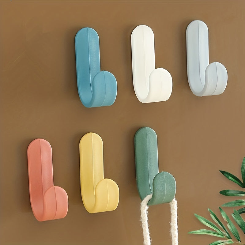 6 Mini Wall Mounted Hooks in 6 Colors for Hanging Items Easily.