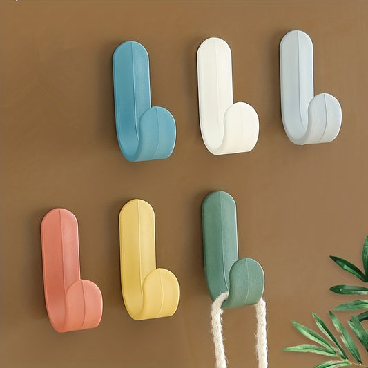 6 Mini Wall Mounted Hooks in 6 Colors for Hanging Items Easily.